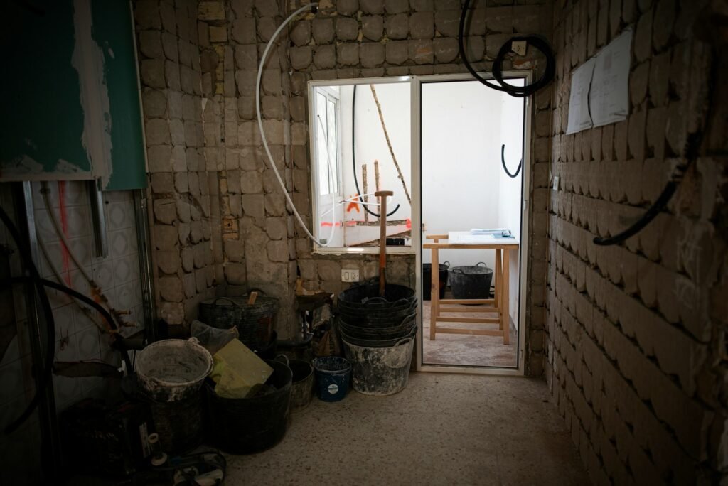 a room that has a bunch of buckets in it